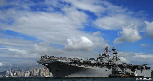 USS Makin Island, a Wasp-class amphibious assault ship, anchored in Hong Kong - the ship resembles a small aircraft carrier