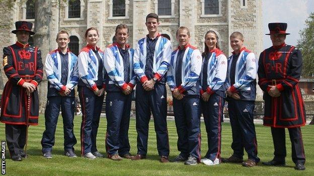 James Huckle, Jennifer McIntosh, Richard Faulds, Peter Wilson, Richard Brickell, Georgina Geikie and Rory Warlow pose at the Tower of London