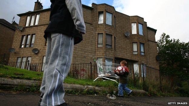 children playing outside house