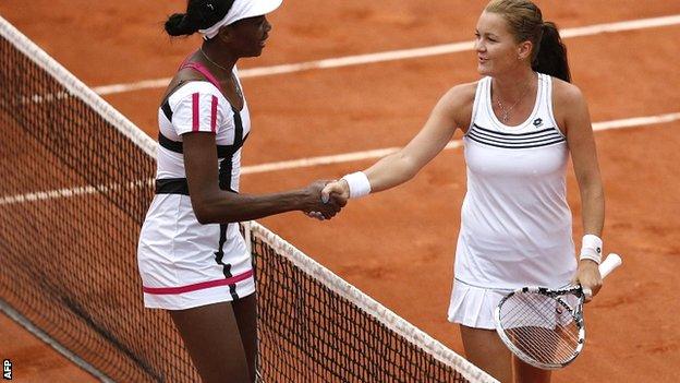 Venus Williams (left) congratulates Agnieszka Radwanska on her victory