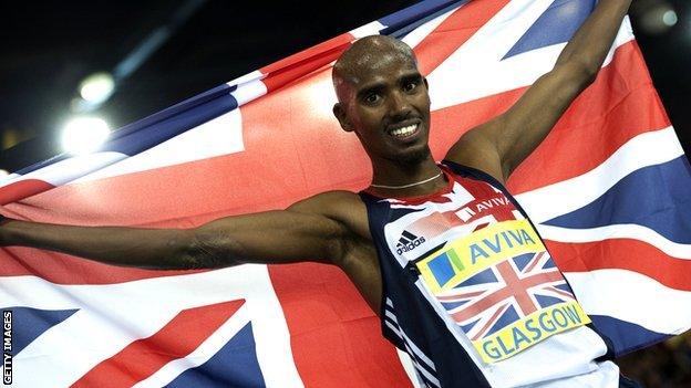 Mo Farah holding Union Jack flag