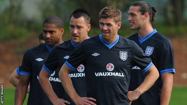 Steven Gerrard looks on in England training