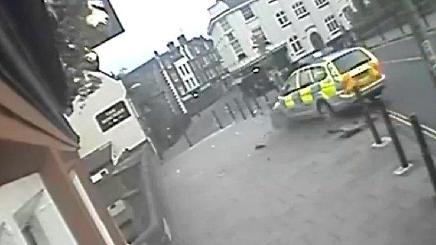 Police car crashing through roadside bollards in Norwich
