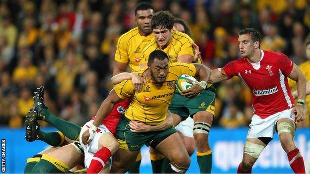 Australia prop Sekope Kepu carries the ball against Wales