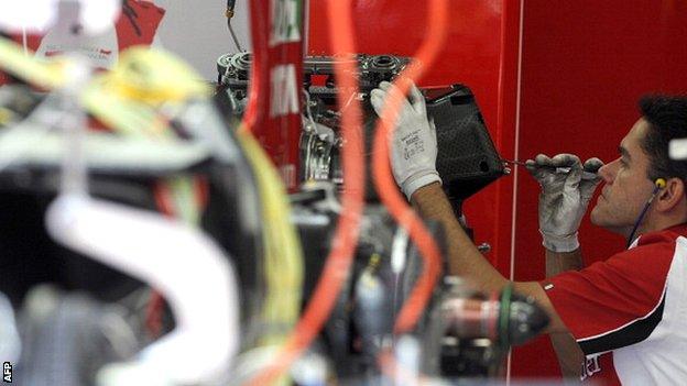 Work being done on a Ferrari F1 car