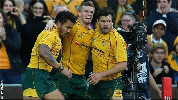 Rob Horne celebrates his try