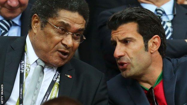 Eusebio (left) with Luis Figo