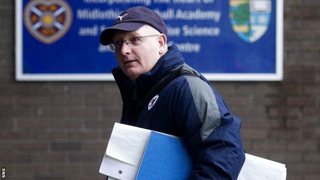 John McGlynn enters Tynecastle for talks