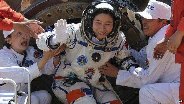 Liu Yang emerges from the return capsule