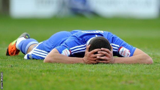 Colin Daniel is dejected after Macclesfield are relegated from the Football League