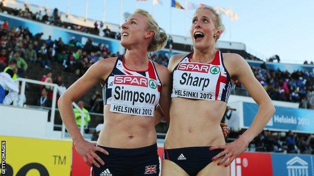 Sharp (right) celebrates her European silver medal