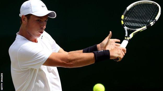 Luke Bambridge playing in the boys' singles at Wimbledon