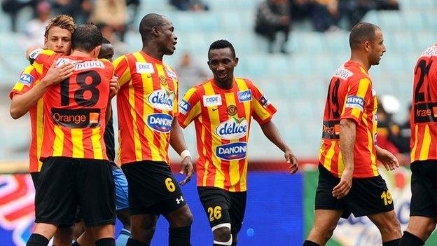 Esperance players congratulate Youssef Msakni (L) on scoring against Brikama United during their African Champions League match in April