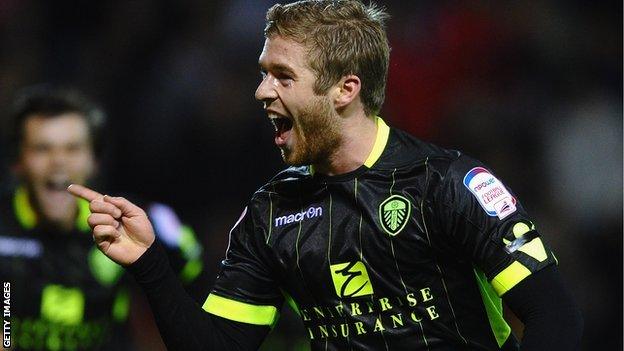 Adam Clayton celebrates scoring for Leeds United