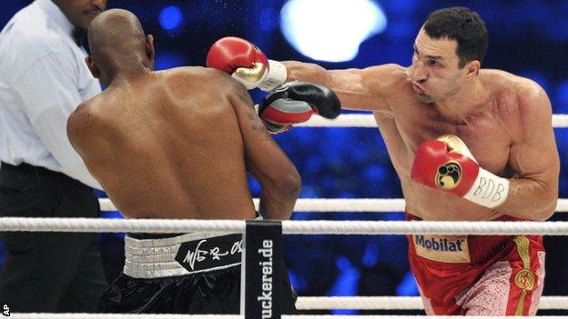 Wladimir Klitschko (right) lands a punch on Tony Thompson