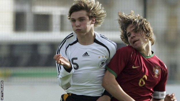 Portuguese midfielder Diogo Amado (right)