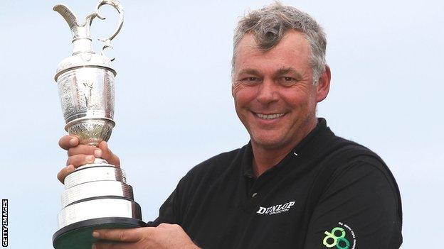 Darren Clarke holds the Open trophy