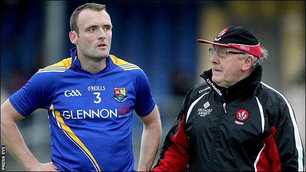 Derry forward Paddy Bradley with county manager John Brennan