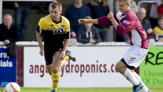 New signing McGinn beats Arbroath's Michael Travis