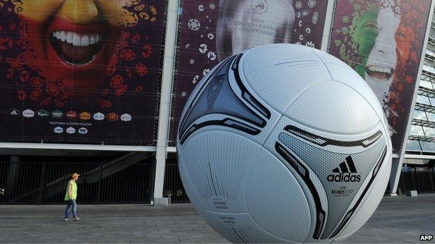 Giant football in front of stadium