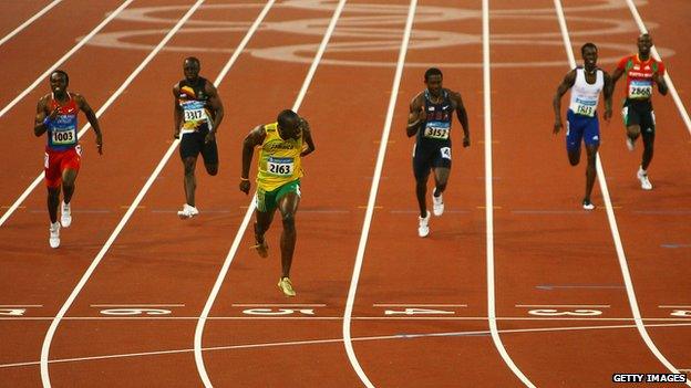 Athletes running on a track