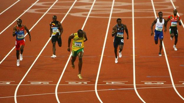 Athletes running on a track