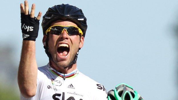 Mark Cavendish celebrates winning on the Champs Elysees for the fourth year in a row on Sunday