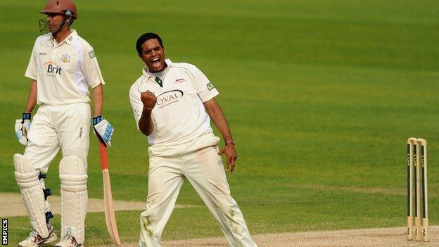 Jigar Naik celebrates a wicket