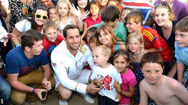 Ben Ainslie greets fans on Weymouth beach