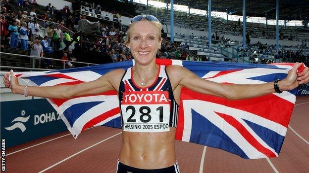 Paula Radcliffe celebrates victory in the marathon at the 2005 World Championships