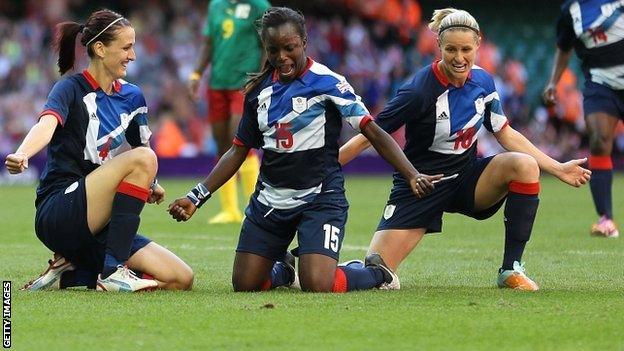 Jill Scott celebrates her goal against Cameroon