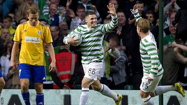 Gary Hooper celebrates with Kris Commons after scoring for Celtic against HJK Helsinki