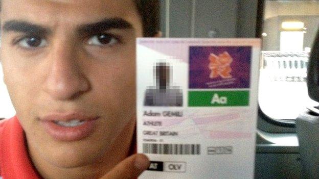 Adam Gemili holds up his Olympic accreditation