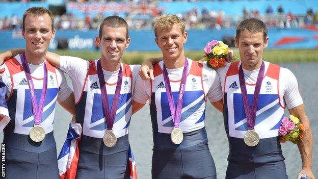 Great Britain's Peter Chambers, Rob Williams, Richard Chambers and Chris Bartley pose on the podium after receiving their silver medals in the men's lightweight four final