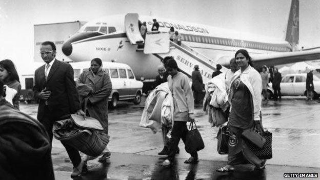 Ugandans arrive at Stansted Airport, UK