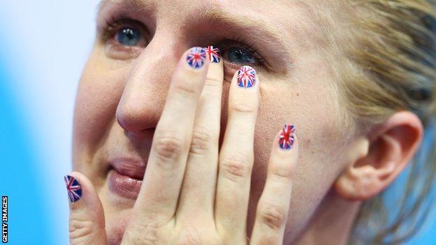 Becky Adlington sheds a tear as she prepares to collect her bronze in the 800m freestyle