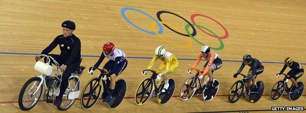 Peter Deary rides on the derny in the Velodrome