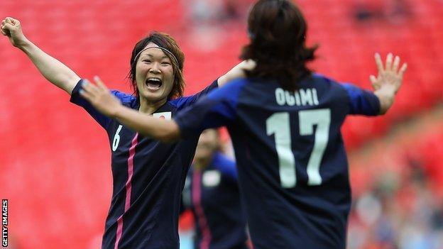 Japan's women celebrate.