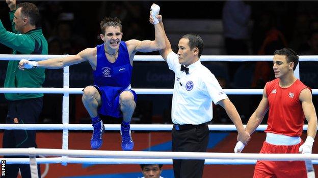 Michael Conlan celebrates his quarter final win over France's Nordine Oubaali