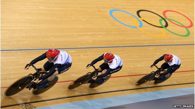 Philip Hinde, Jason Kenny and Sir Chris Hoy compete in the Men's Team Sprint Track Cycling first round in the velodrome at London 2012