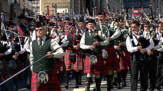 Pipers Beat the Retreat through Glasgow