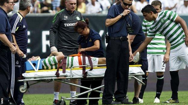 Celtic forward Dylan McGeouch left the field on a stretcher