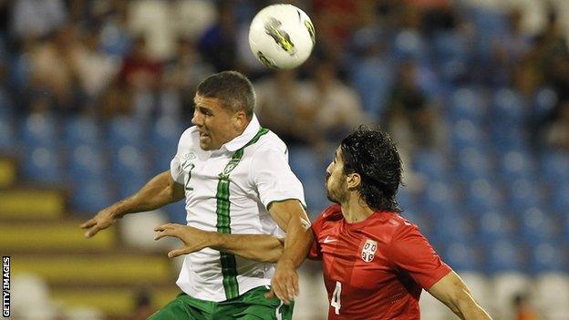 Jon Walters fight out an aerial duel with Milan Bisevac