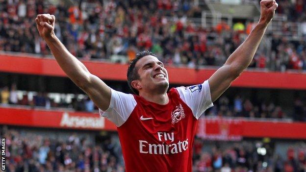 Robin Van Persie celebrates for Arsenal