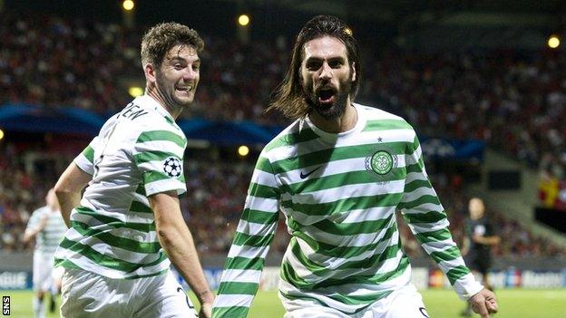 Charlie Mulgrew rushes to congratulate Celtic goalscorer Georgios Samaras