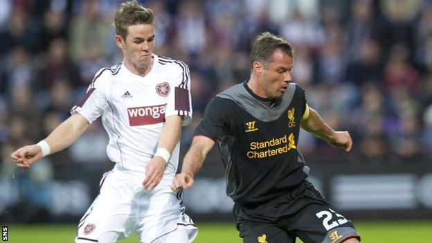 Hearts' David Templeton tussles with Liverpool defender Jamie Carragher