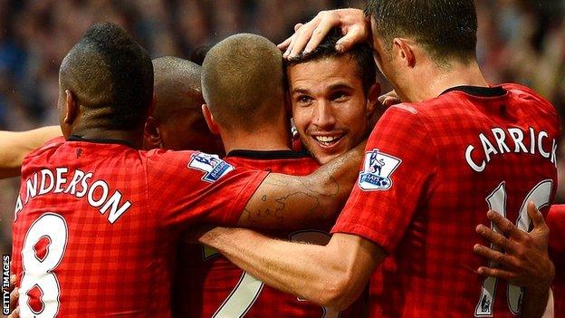 Robin van Persie congratulated by team-mates