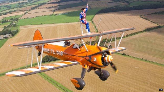 Beth Tweddle wing-walking over Gloucestershire countryside