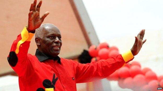 Angolan President Jose Eduardo dos Santos greets a crowd on 29 August 2012