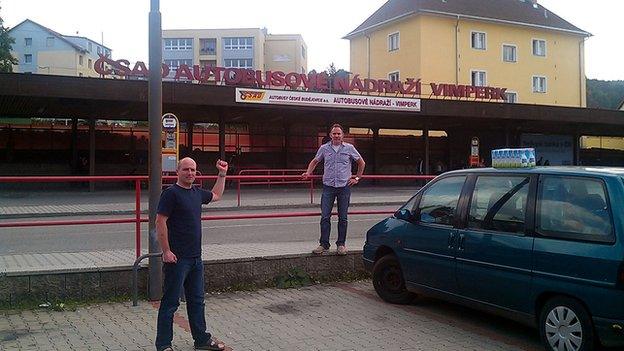 Rob and a friend at Vimperk bus station in 2012